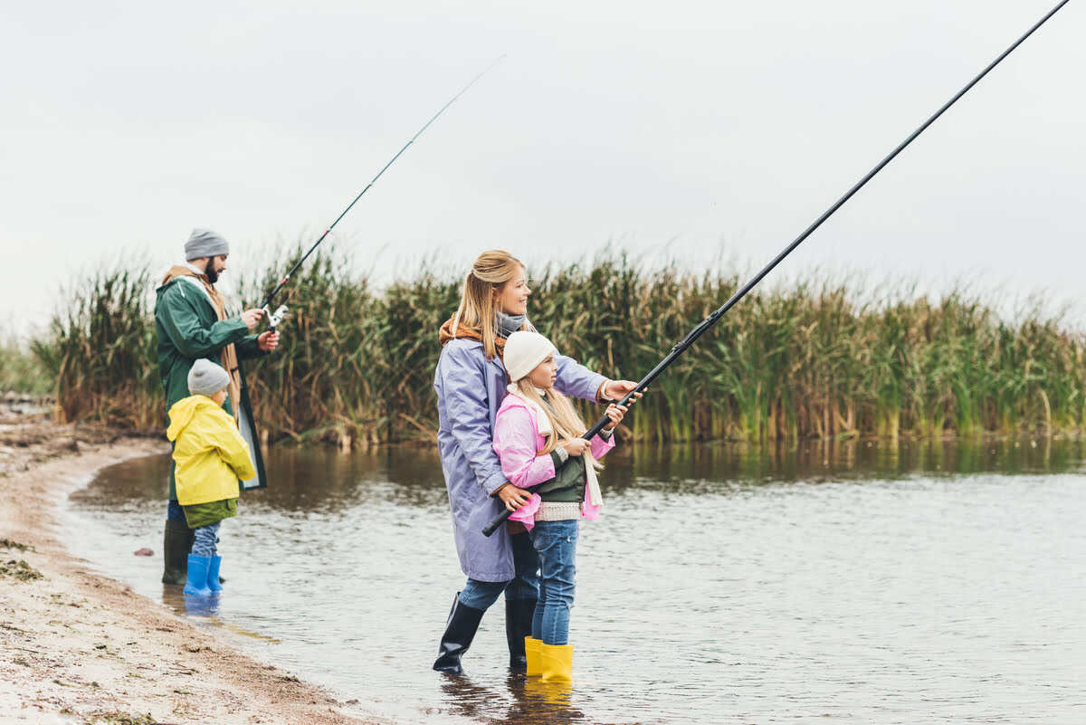 Family wearing fishing boots