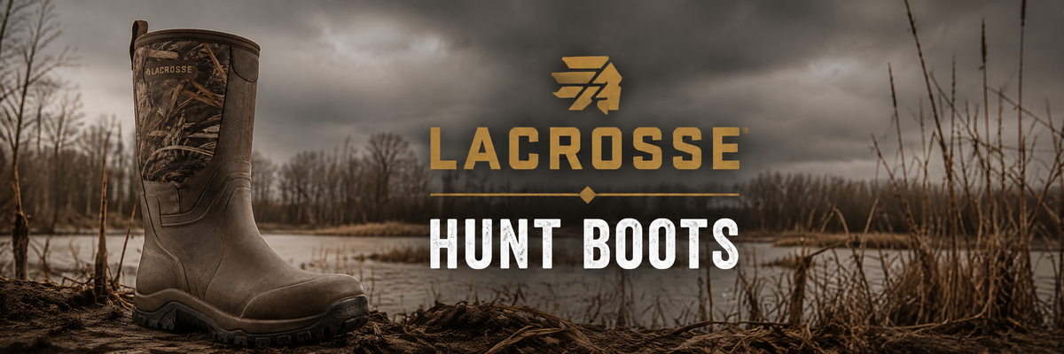 A single camouflage-patterned hunting boot stands in a marsh under a dark, overcast sky, with the Lacrosse brand logo and the words 'HUNT BOOTS' overlaid on the scene.