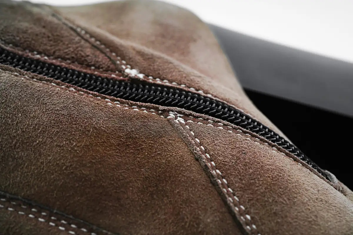 close up of brown side zip brown work boots