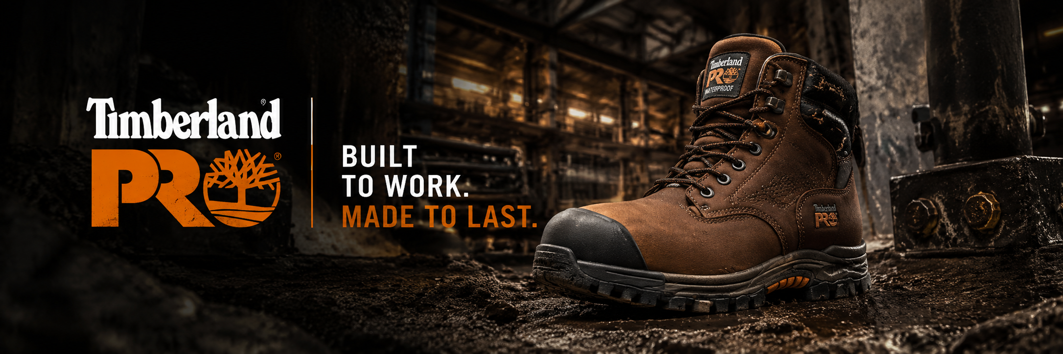 Timberland PRO work boot in brown leather with a black toe cap, shown in a dark industrial setting with Timberland branding and the slogan 'Built to work. Made to last.